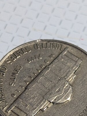 1941 Jefferson nickel Doubled Die Reverse showing extra thickness on E PLURIBUS UNUM reverse lettering